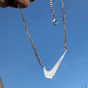 NIKE. Gold Swoosh Pendant Necklace in 2023